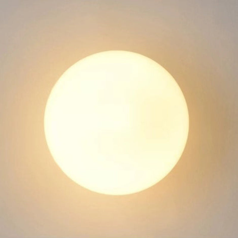 Elegant Glass Sphere Wall Light with Aluminum Base for Indoors